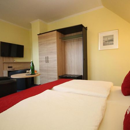 Hotel Morgensonne Garni Бюзум Экстерьер фото