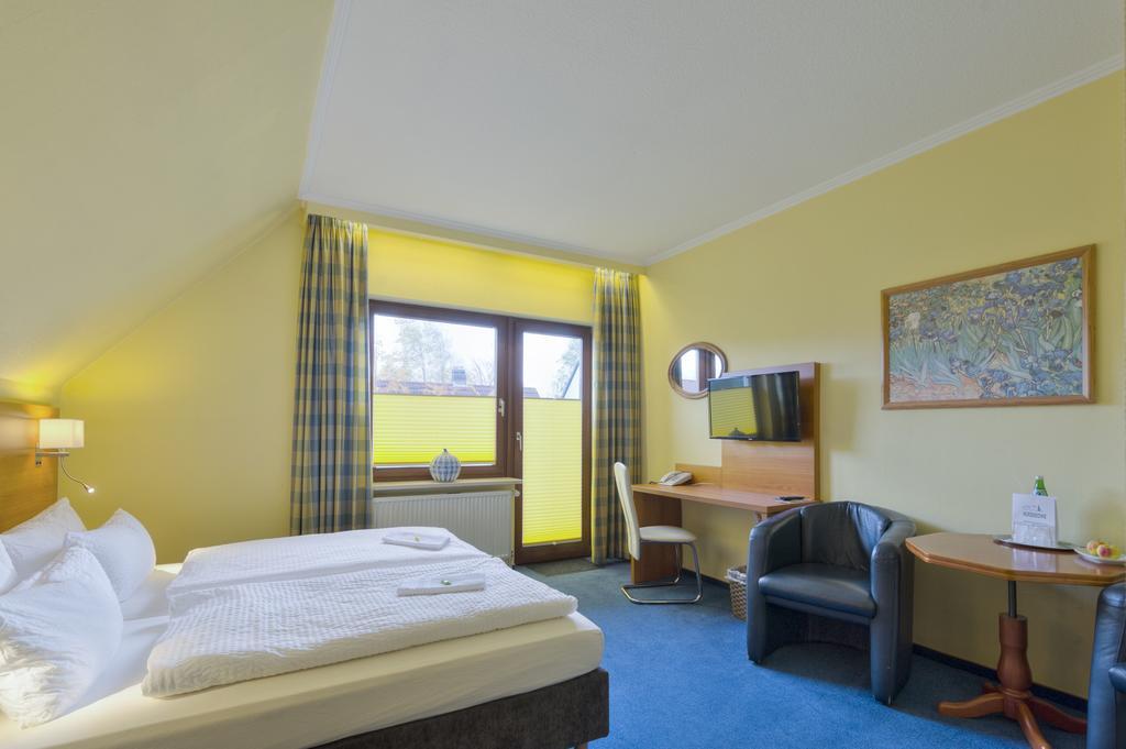Hotel Morgensonne Garni Бюзум Экстерьер фото